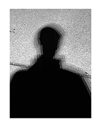 Black and white shadow portait of Austin Metzger. Photo taken by Austin Metzger